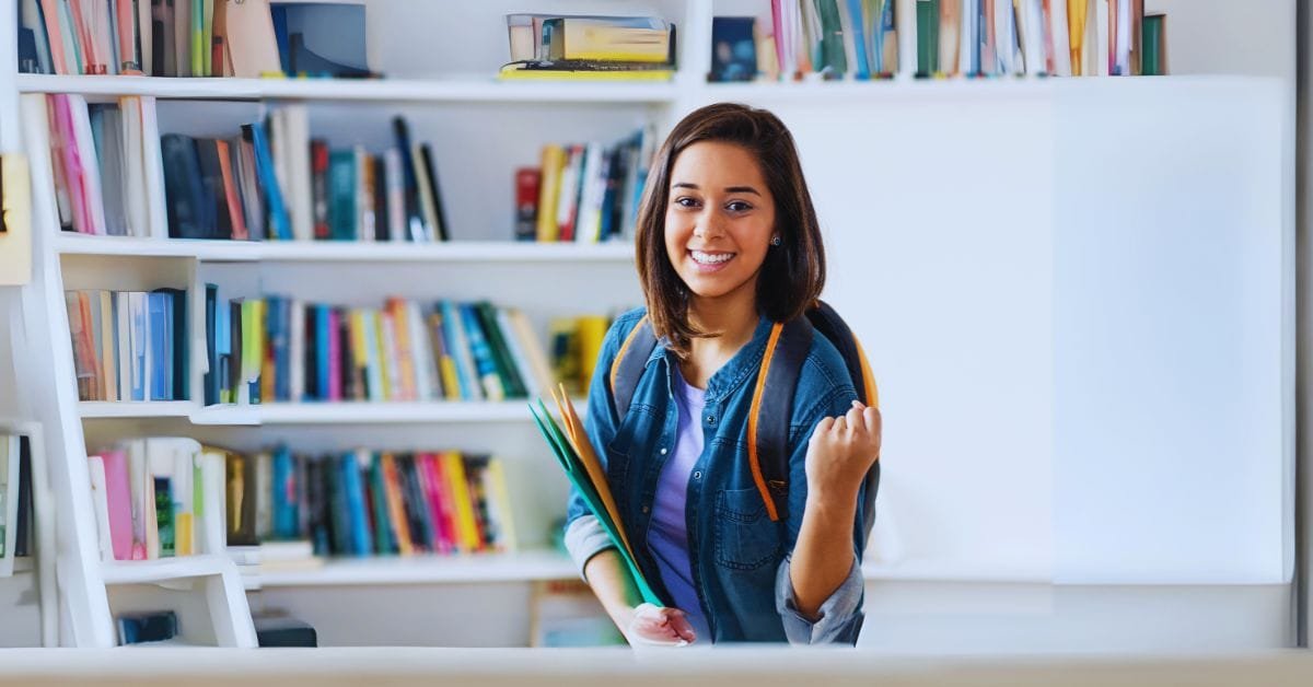 girl happy as she understands Spanish Verb Conjugation